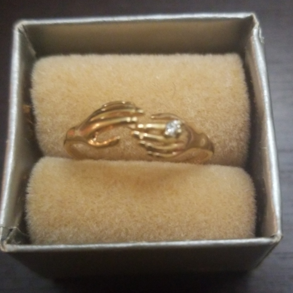 14K gold hand holding hand ring